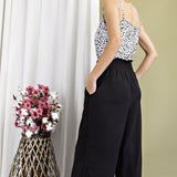 BLACK SMOCKED WIDE LEG PANTS