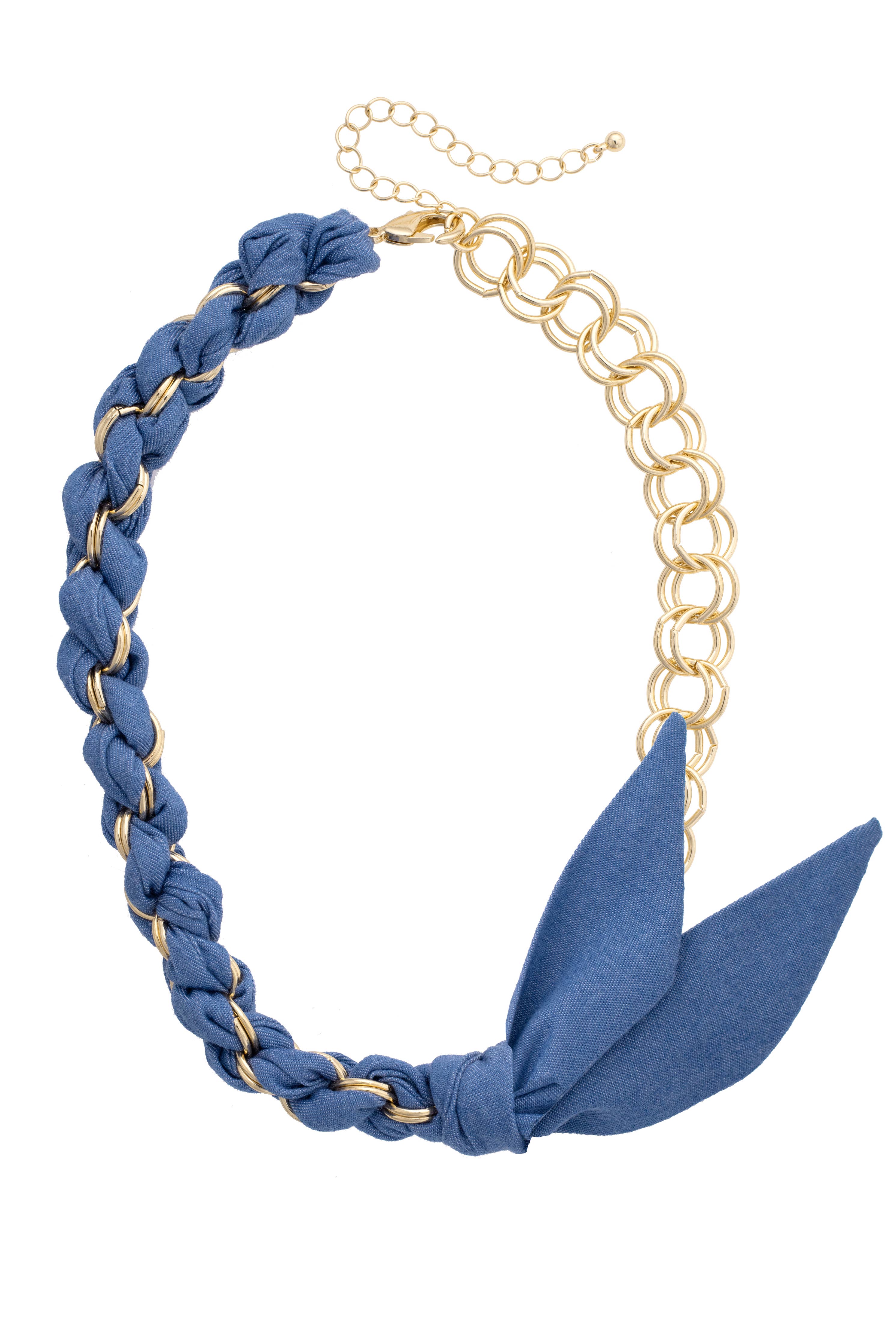 Necklace with blue braided cord and leaf-shaped pendants on a white background