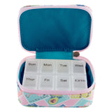 Weekly pill organizer with floral case on a white background