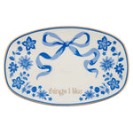 Decorative plate with blue floral patterns and a bow, featuring the text 'things I like'.