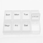 White pill organizer with days of the week labels on a white background