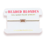 College Logo on Gold Beaded Bracelet
