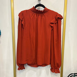 RUST LONG SLEEVE TOP WITH SHOULDER RUFFLE